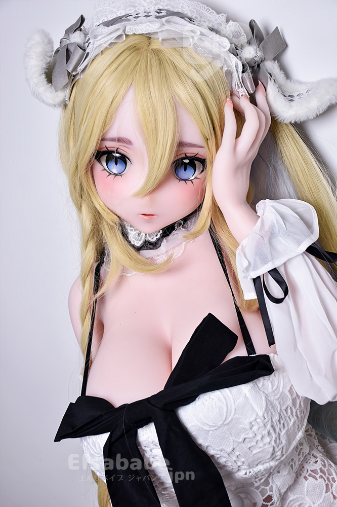Life-like anime-style doll with blonde hair and blue eyes, wearing a white lace cosplay outfit with a black bow.