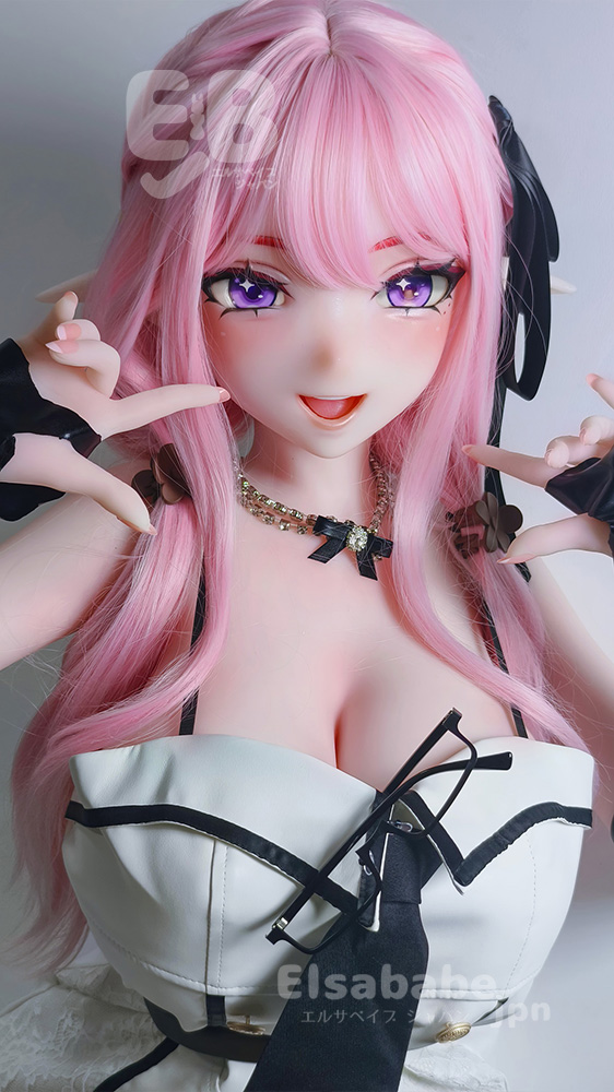 Life-like doll with pink hair and purple eyes, wearing a white corset with black ribbons, posed with hands near the face.
