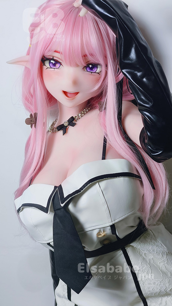 Life-like pink-haired anime doll with elf ears and purple eyes, wearing a white and black corset-style outfit and black accessories, posing playfully.