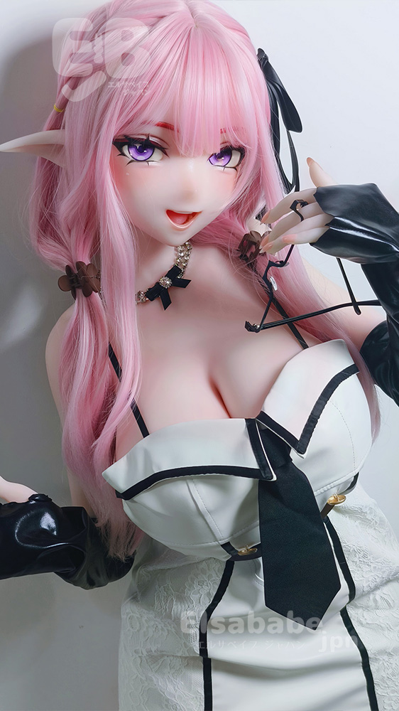 Anime-style pink-haired cosplay doll with elf ears wearing a white lace corset dress and black gloves, smiling at the camera.