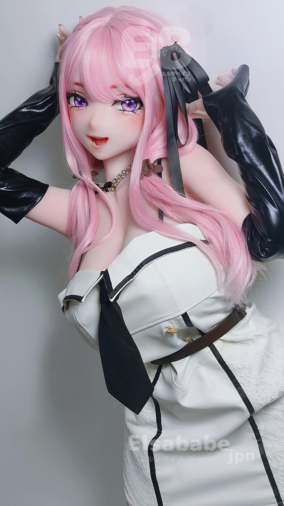 Cosplay doll with pink hair and purple eyes wearing a white dress with black trim and long black gloves, posing playfully against a gray background.